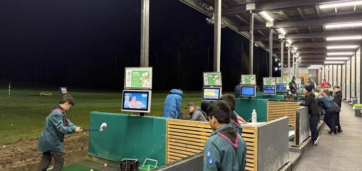 Scouts at golf driving range